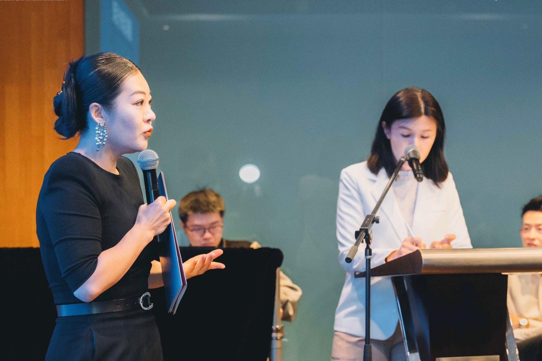 Professional interpreter delivering live interpretation at a corporate event in Malaysia