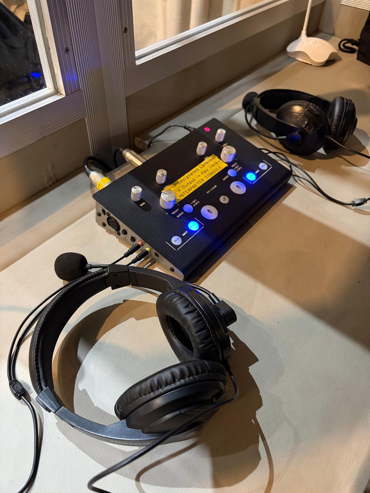 Professional interpreter console and headsets used for simultaneous interpretation